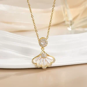 Diamond-encrusted shell and pearl necklace